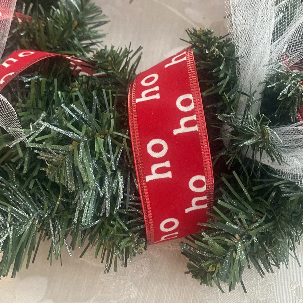 Winter holiday wreath with ho ho ho & BELIEVE adornments evergreen base